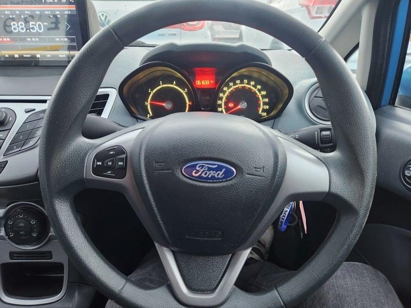 The Steering Wheel of a blue Ford Fiesta car