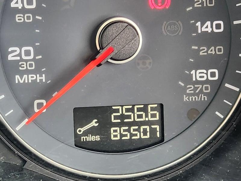 A close-up of the speedometer and odometer of an Audi A3