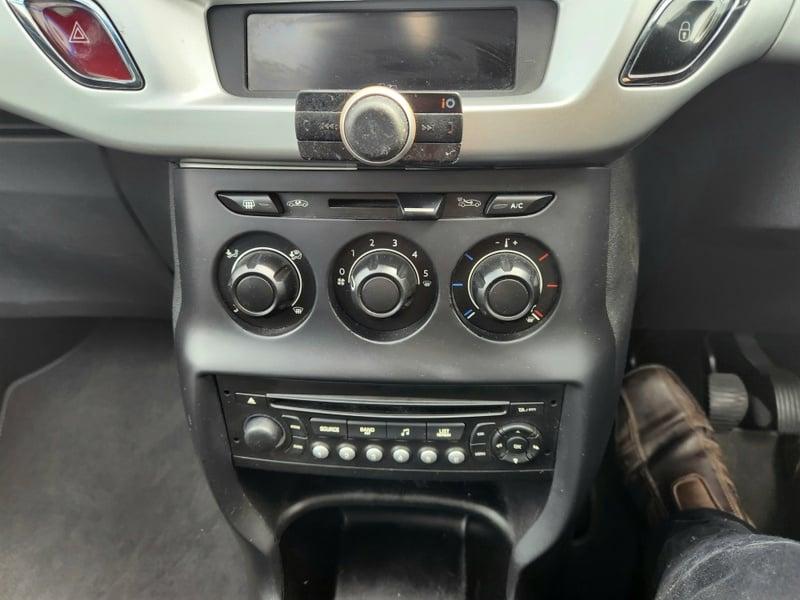 The center console of a gold Citroen C3 VTR+