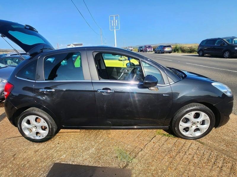 A black Citroen C3 viewed from the right side