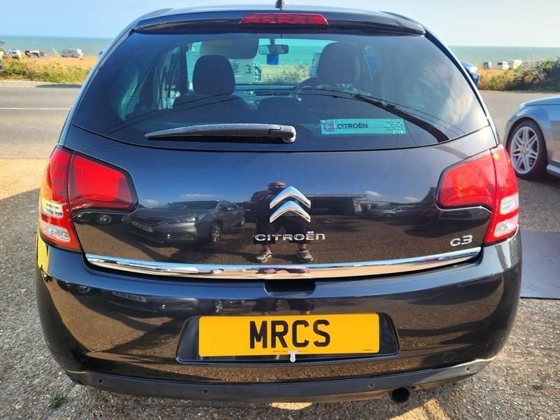 A black Citroen C3 viewed from the back