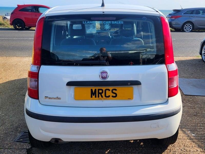 A white Fiat Panda Active viewed from the back