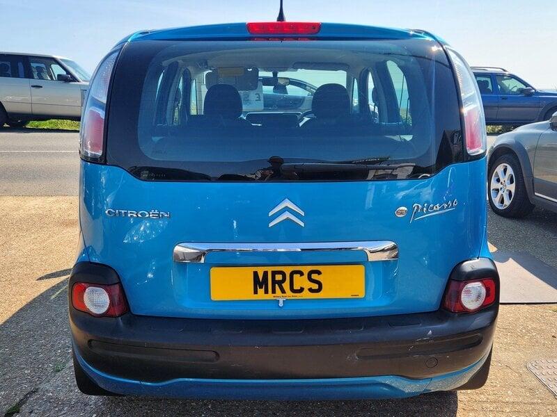 A blue Citroen C3 Picasso &#039;HDI VTR+&#039; viewed from the back