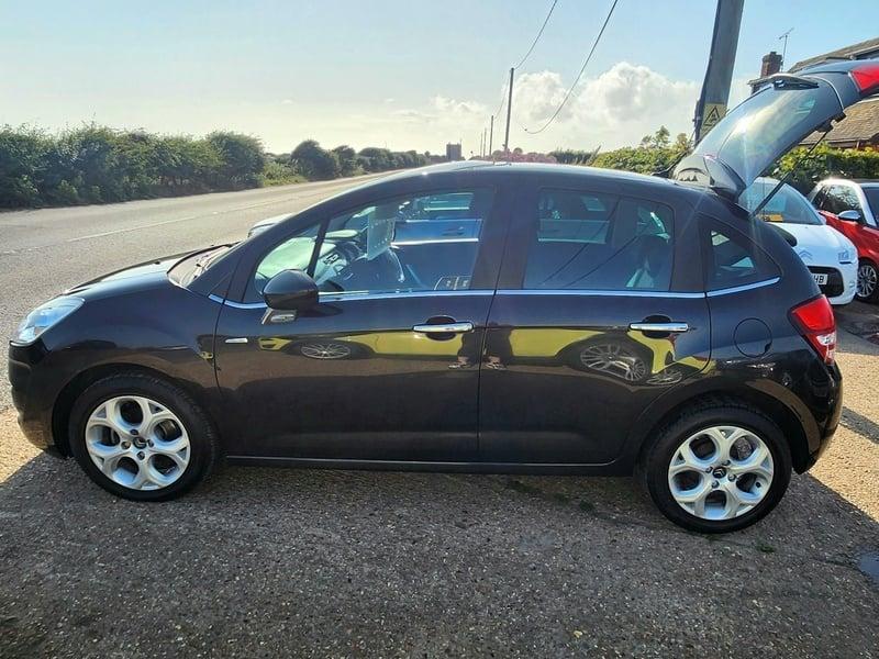A black Citroen C3 viewed from the left side
