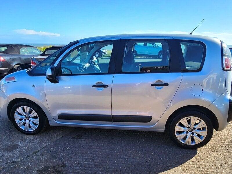 A silver Citroen C3 Picasso viewed from the left side