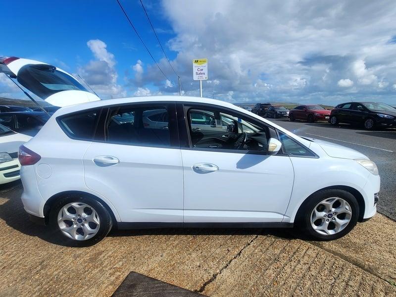 A white Ford C Max 1.6 Zetec viewed from the right side