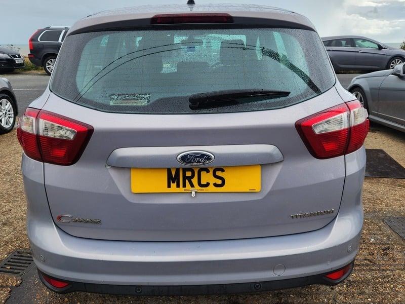 A silver Ford C Max 1.6 TDCI Titanium viewed from the back