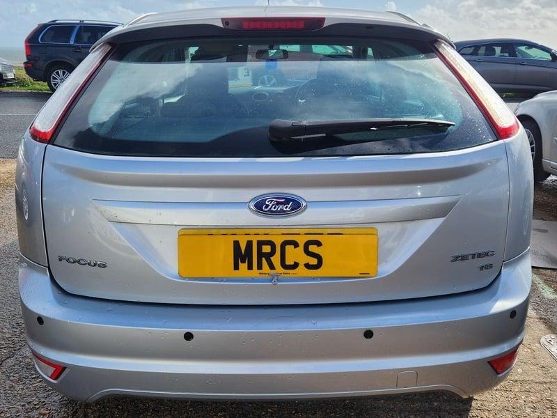 A silver Ford Focus Zetec 125 viewed from the back