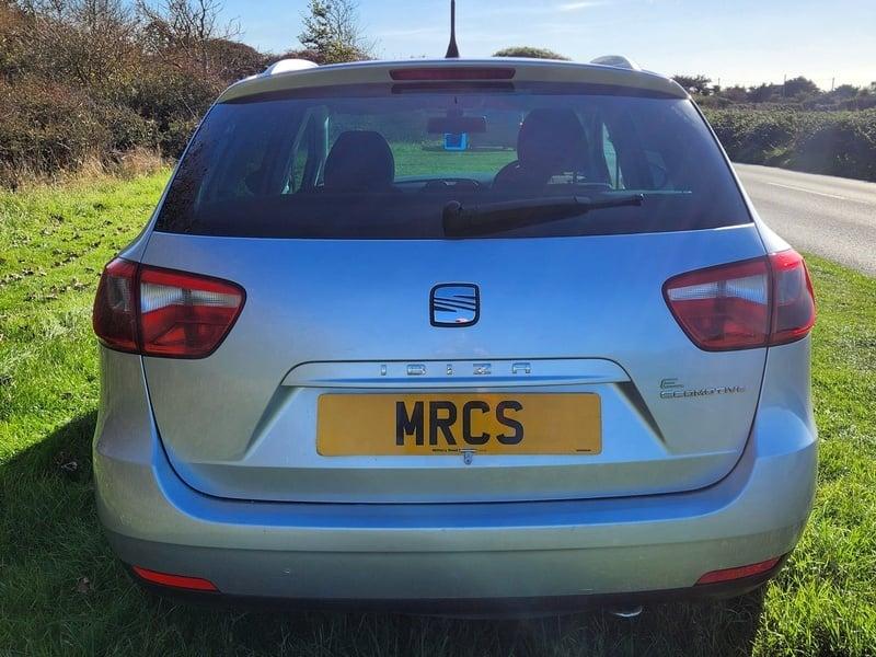 A silver Seat Ibiza viewed from behind