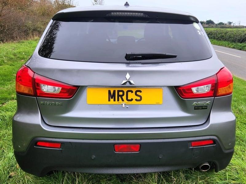 A grey Mitsubishi ASX viewed from the outside back