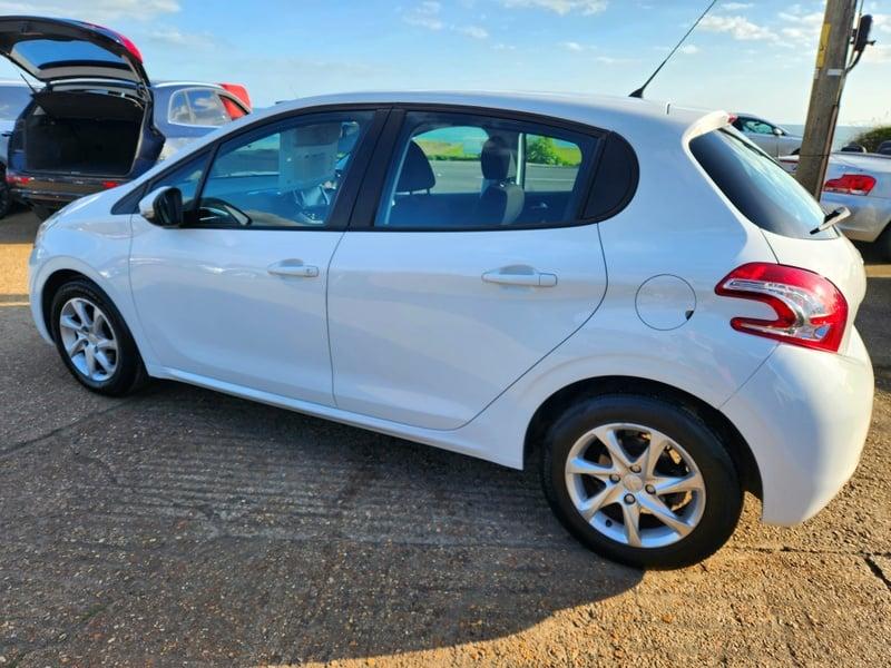 A white Peugeot 208 Active viewed from the outside left