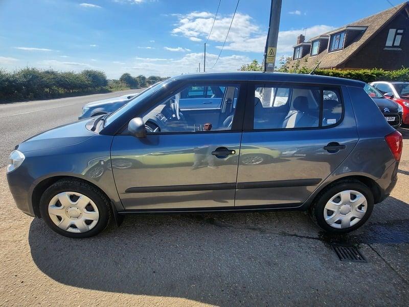 A graphite Grey Metallic Skoda Fabia viewed from the outside left