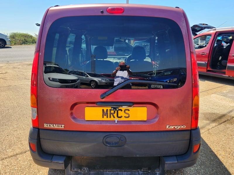A red Renault Kangoo Authentique viewed from behind