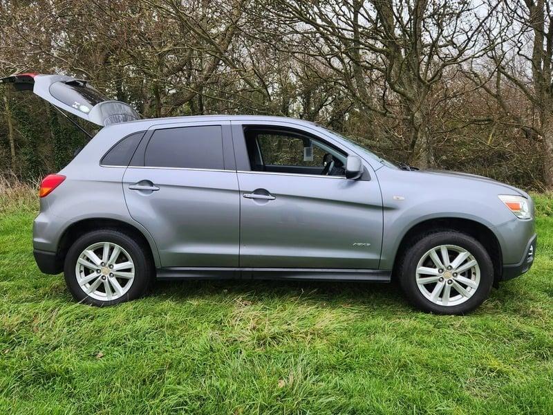 A grey Mitsubishi ASX viewed from the outside right