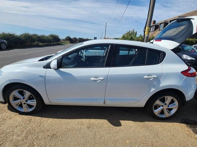 A white Renault Megane Dynamique viewed from the outside left