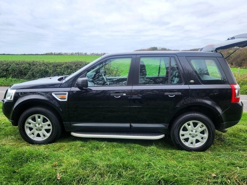 A black Land Rover FreeLander viewed from the outside left