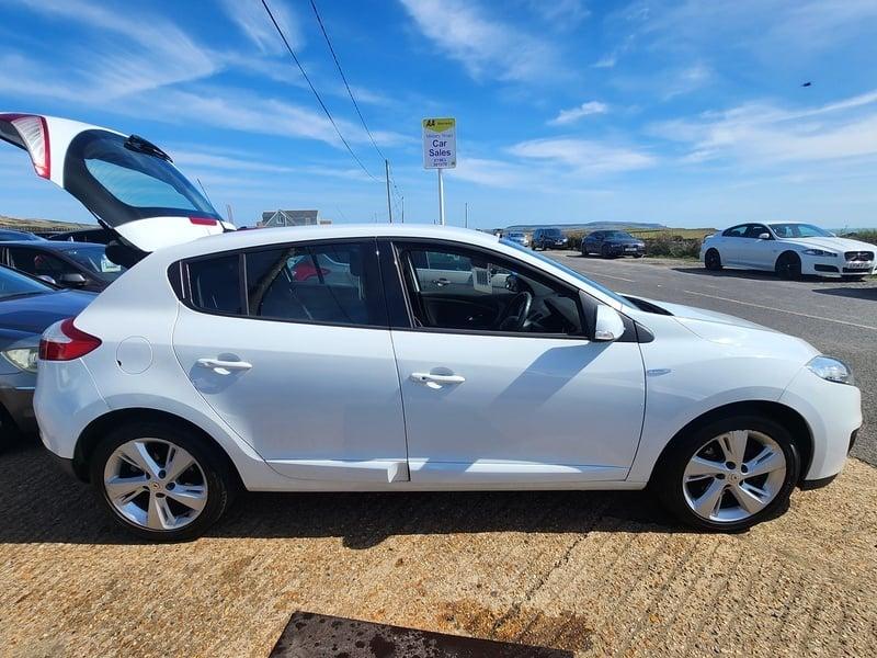 A white Renault Megane Dynamique viewed from the outside right