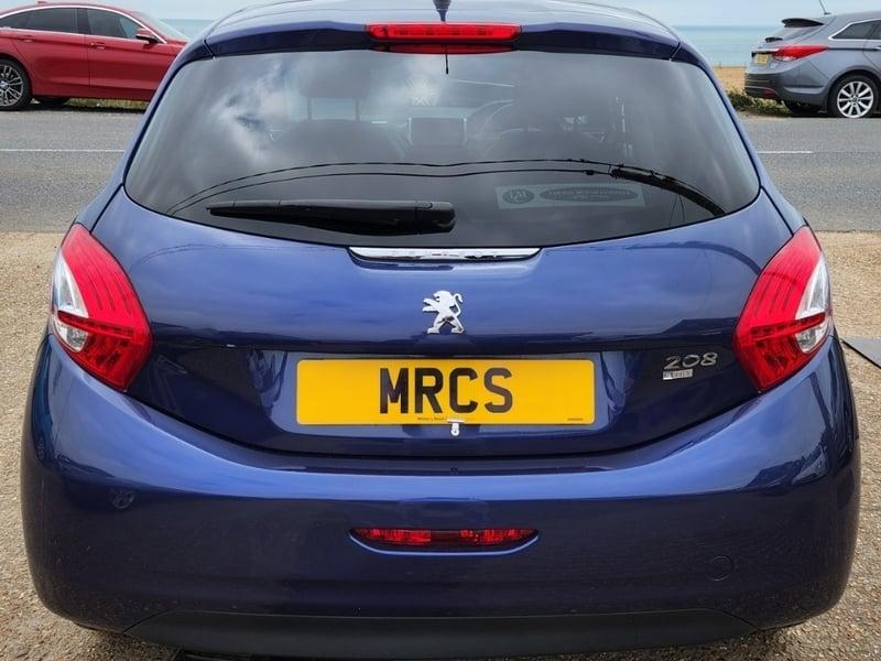 A Vertigo Blue Peugeot 208 viewed from behind
