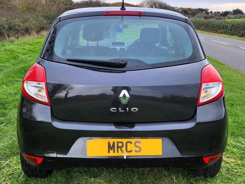 A black Renault Clio Dynamique viewed from behind