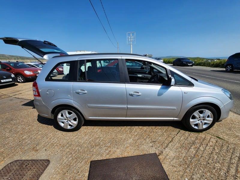 A silver Vauxhall Zafira viewed from the right side