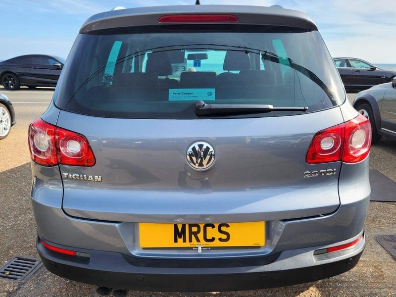 A grey Volkswagen Tiguan viewed from behind