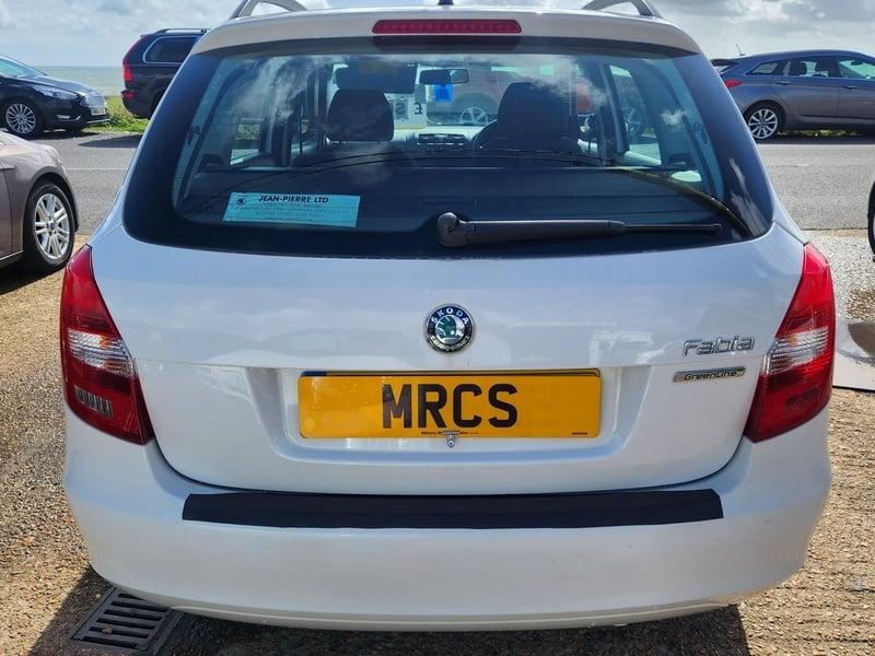 A white Skoda Fabia Greenline TDI CR Estate vewed from behind