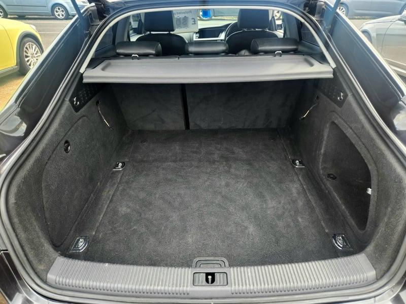 The boot of a monsoon grey Audi A5 Sportback from behind
