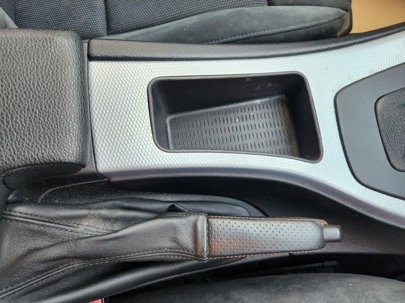 The handbrake and lower center console of a BMW 3 Series 320d M Sport