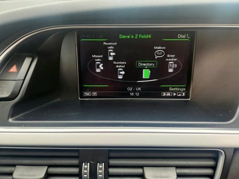 The center display of a monsoon grey Audi 5 Sportback