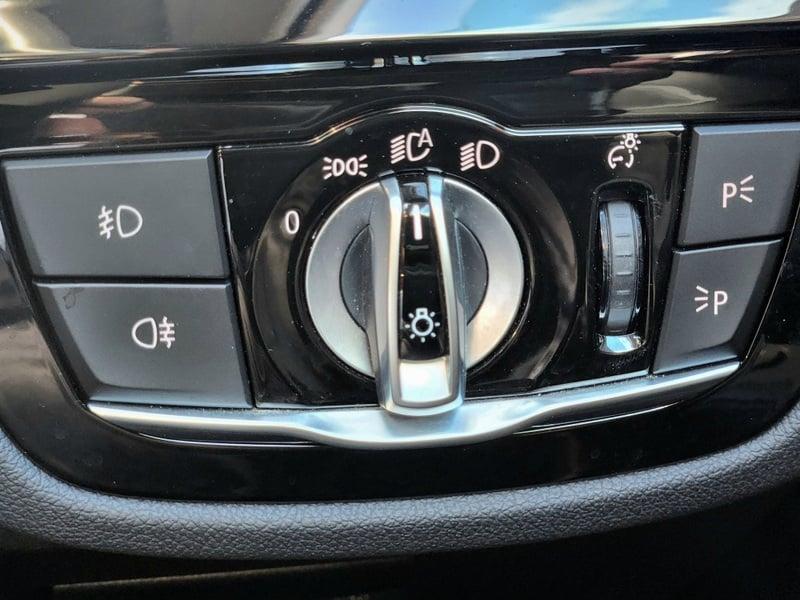 A light control panel on a BMW 5 Series Touring 520d M Sport Auto
