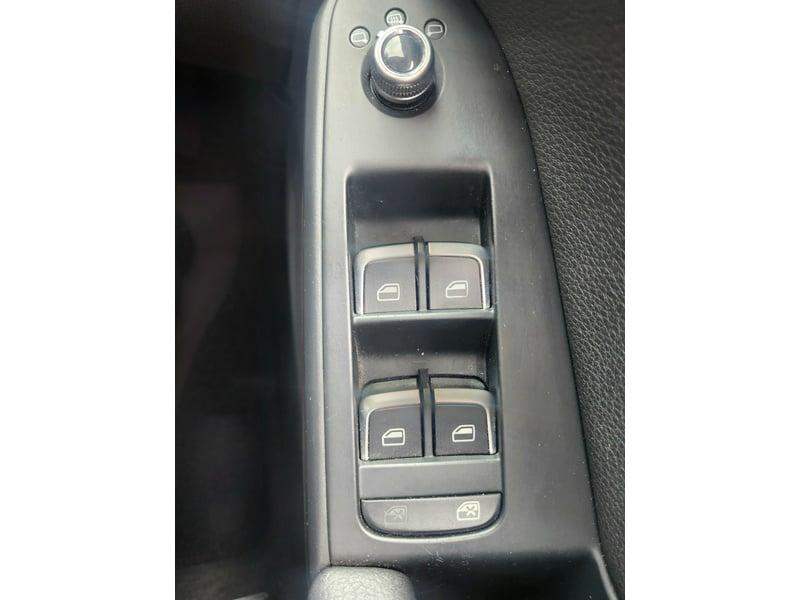 The window controls of a monsoon grey Audi A5 Sportback