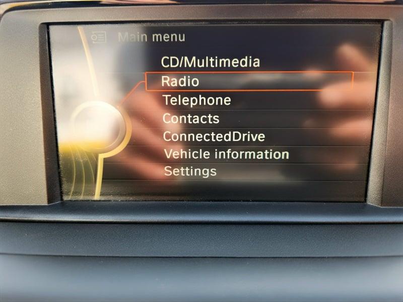 The central display panel of a BMW 1 Series 116i Sport