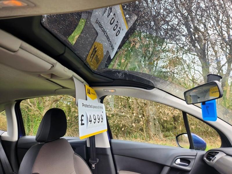 The extended front windscreen of a Citroen C3 1.0 VTi VTR+