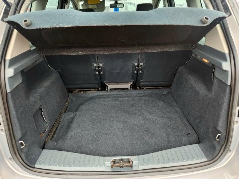 The boot of a silver Ford C Max 1.6 TDCi from behind