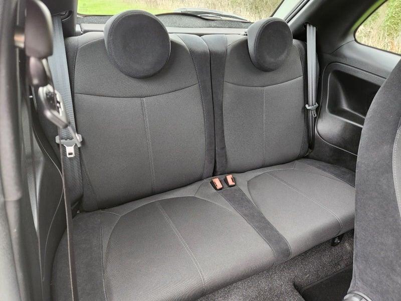 The rear seats of a Fiat Abarth 1.4 from the right side.