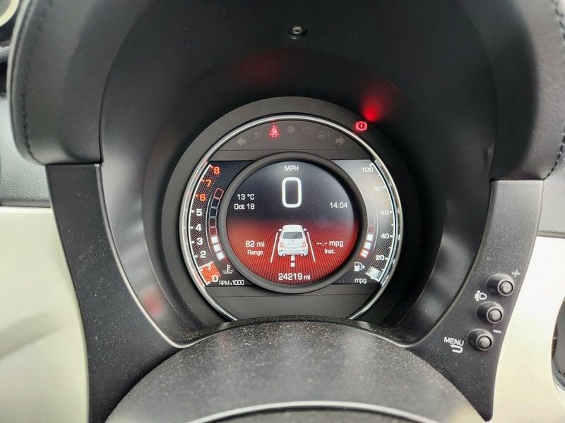 The instrument cluster of a Fiat Abarth 1.4.