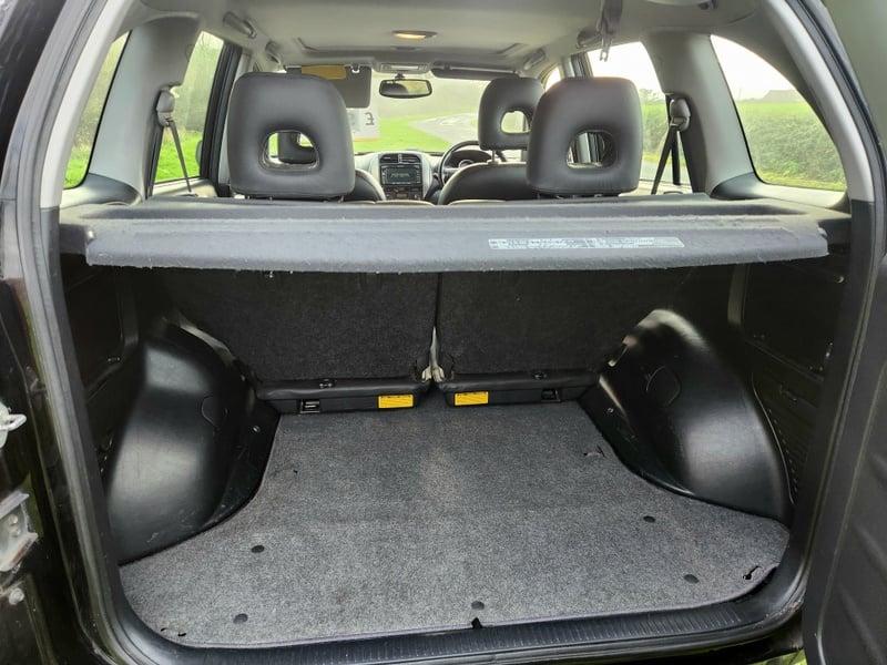 The boot of an Eclipse Black Toyota Rav-4 2.0 XT5, viewed from behind.