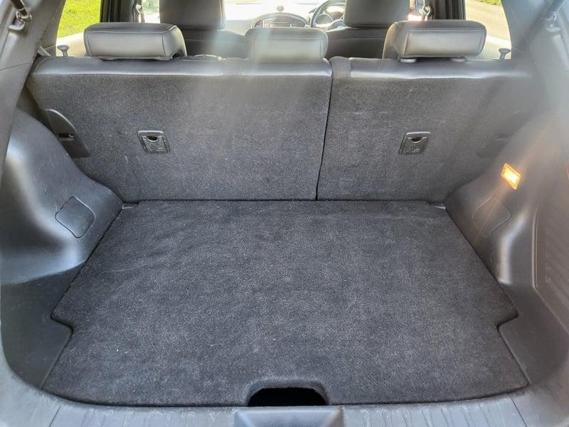 The boot of a Gun Metal Grey Nissan Juke 1.5 dCi N-Connecta, viewed from behind.