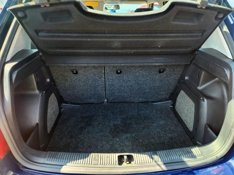 The boot of an Ocean Pacific Blue Skoda Fabia 2 Blueline, viewed from behind.