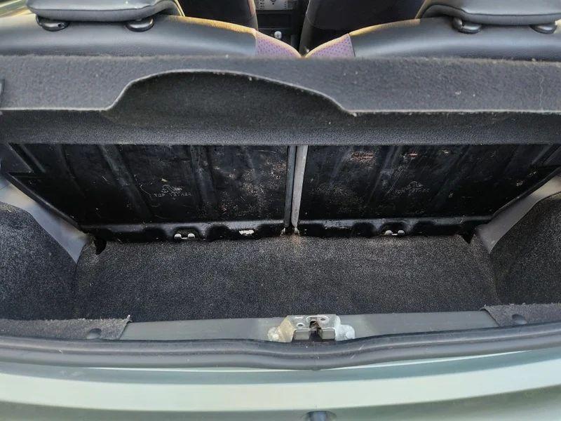 The boot of a Citroen C1 VTR+ viewed from behind.