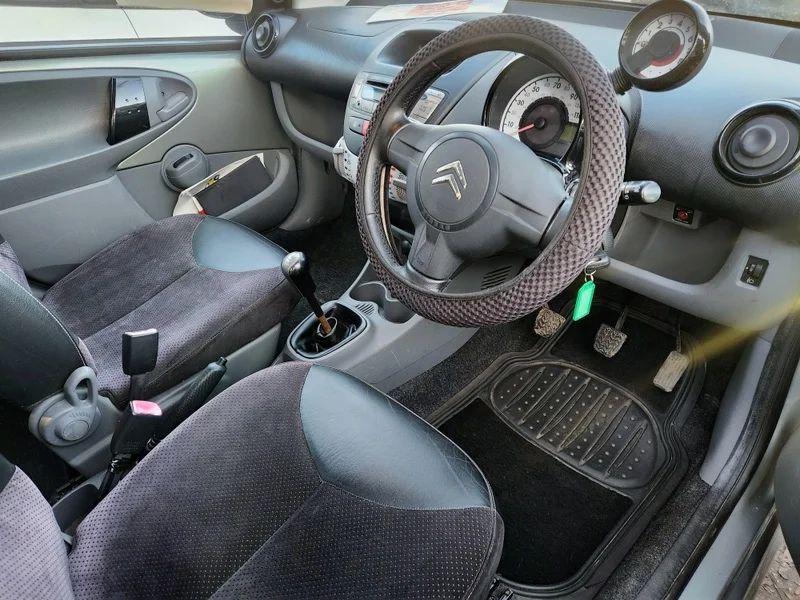 A Citroen C1 VTR+ interior viewed from the driver seat.