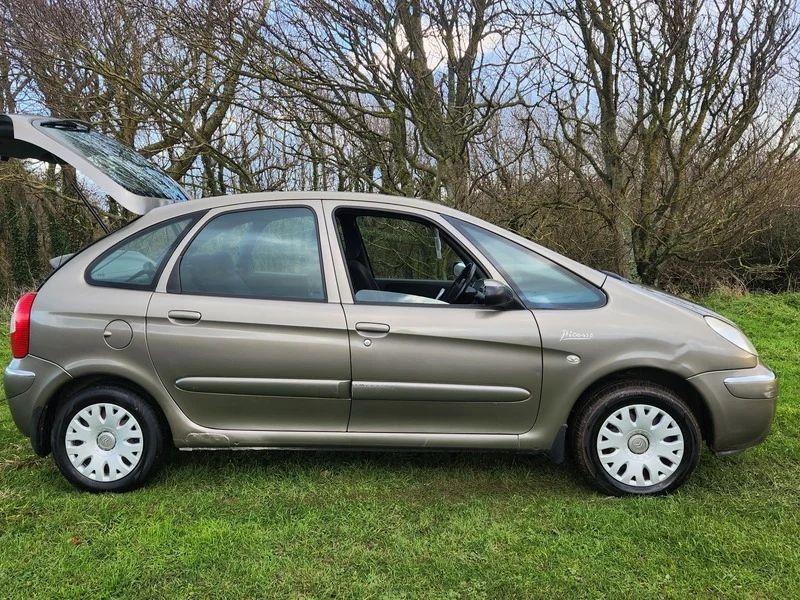 A Bronze Persan Metallic Citroen viewed from the driver side