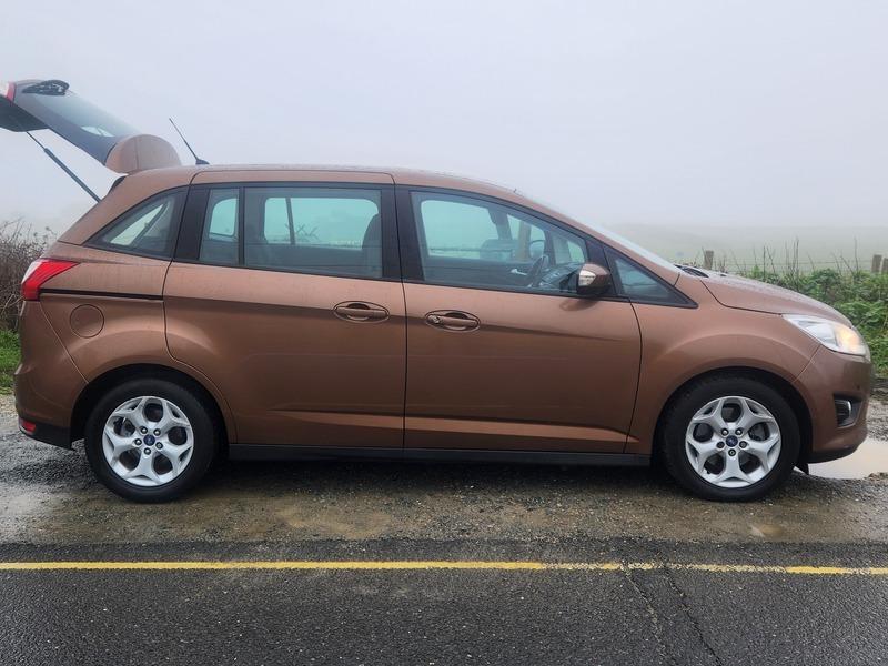 A brown Ford C Max viewed from the driver side