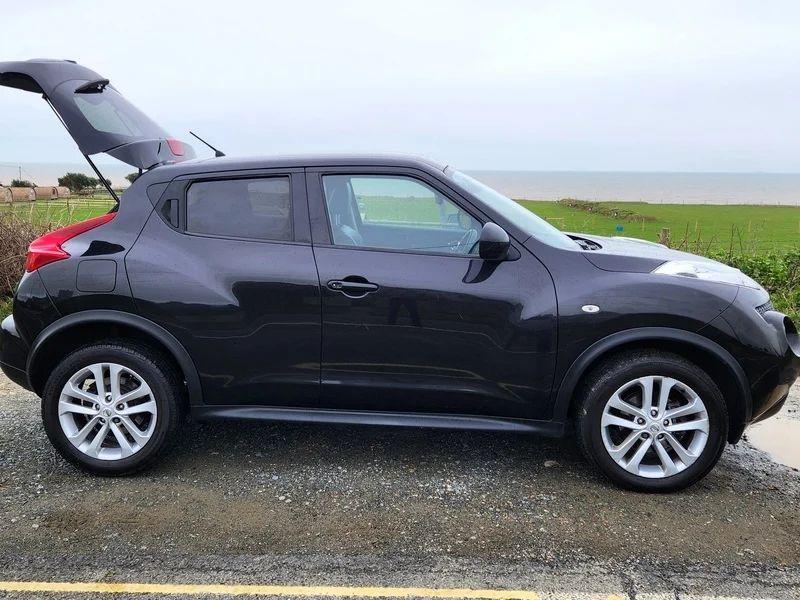 A black Nissan Juke viewed from the driver side