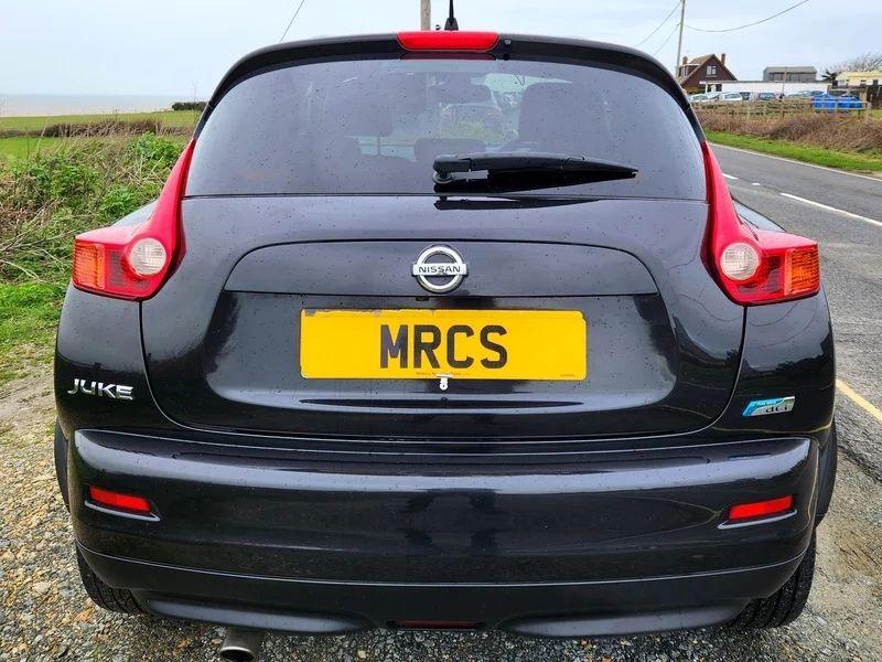 A black Nissan Juke viewed from the back