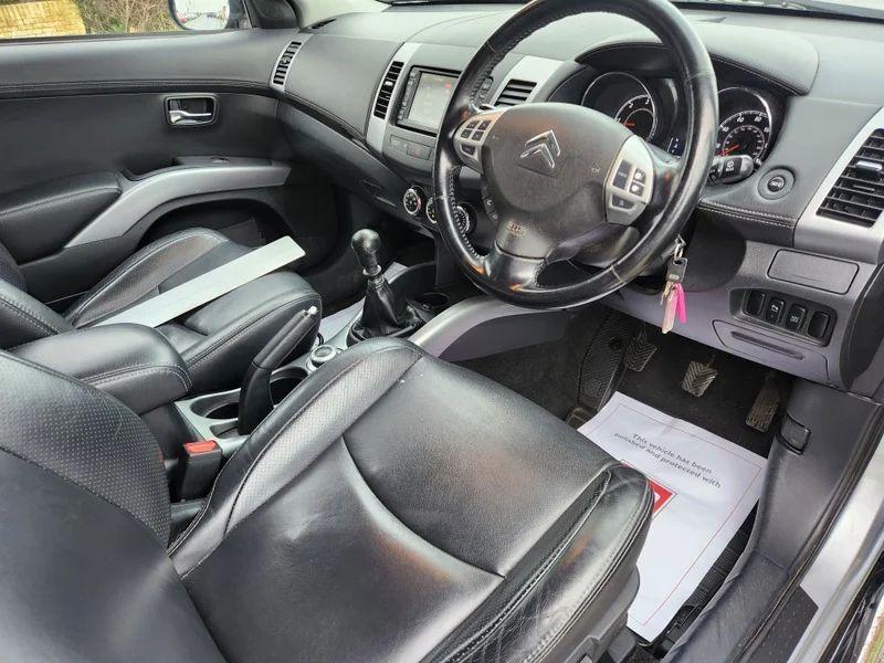 The steering controls of a Citroen C-Crosser viewed from above the driver seat