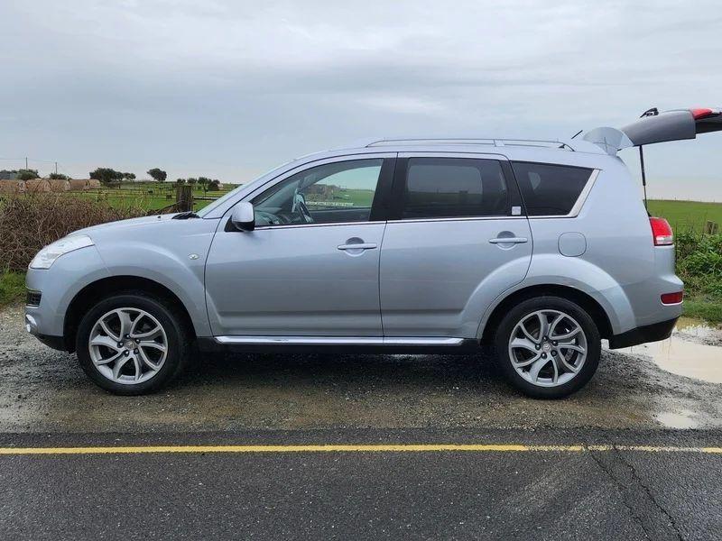 A Citroen C-Crosser viewed from the passenger side