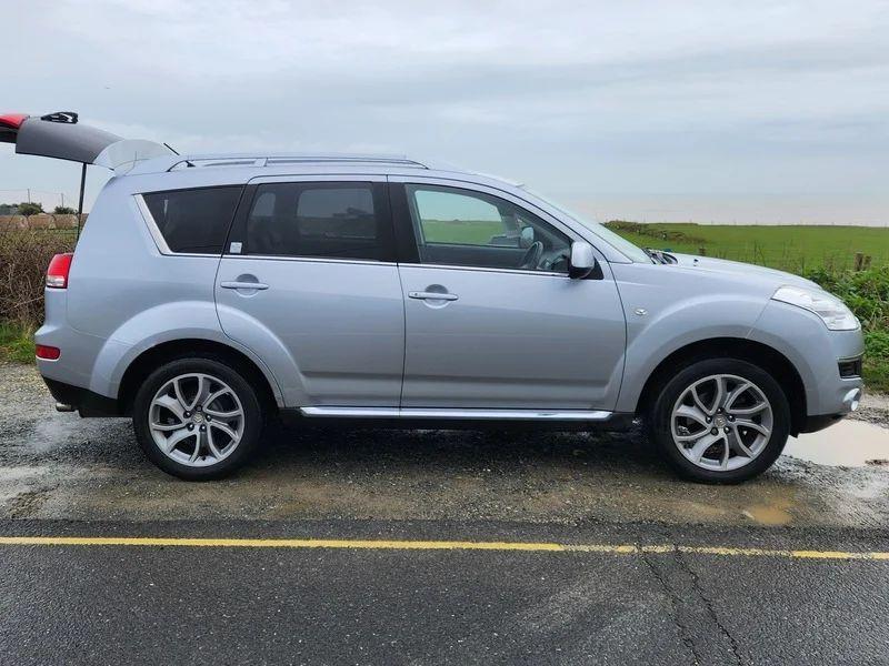 A silver Citroen C-Cross viewed from the driver side