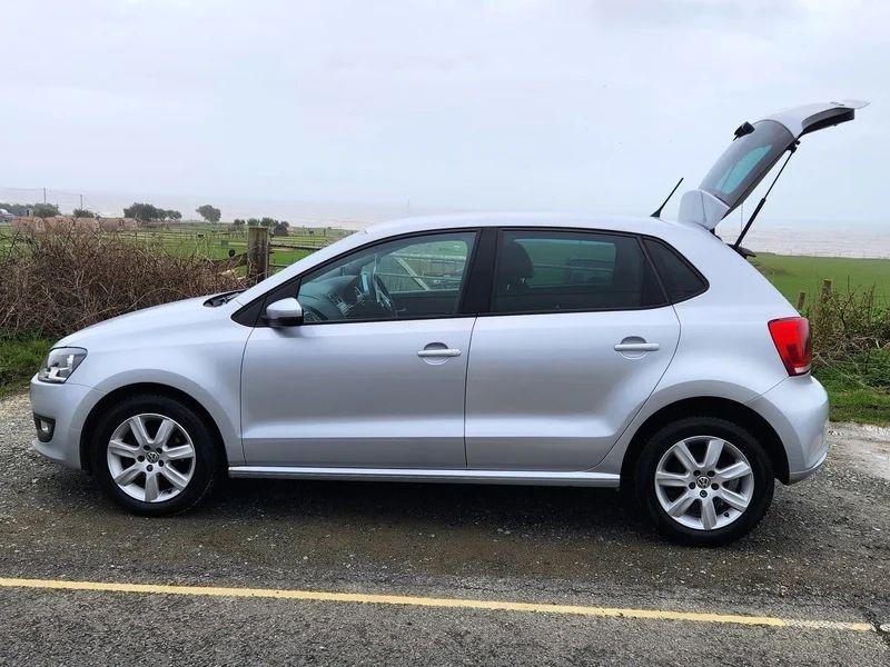 A silver Volkswagen Polo Match viewed from the passenger side