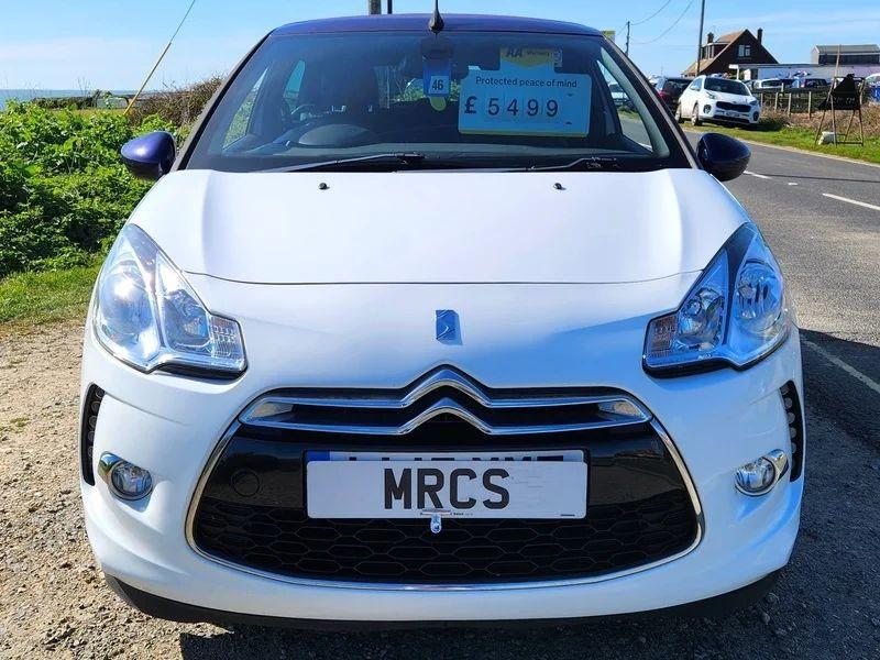 A white Citroen DS3 Convertible viewed from the front
